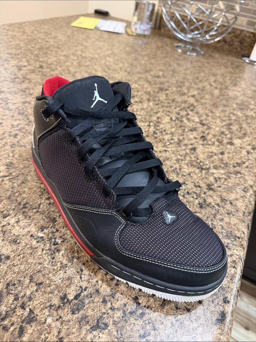 Jordan As-You-Go Men’s Black with Red Accents Mid-Top Sneakers